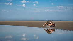Yoga am Strand bei der Gesundheitswoche